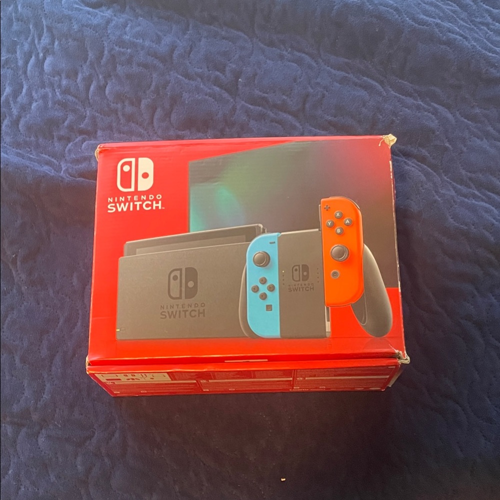 Nintendo Switch Console with Blue and Orange Joy-Con